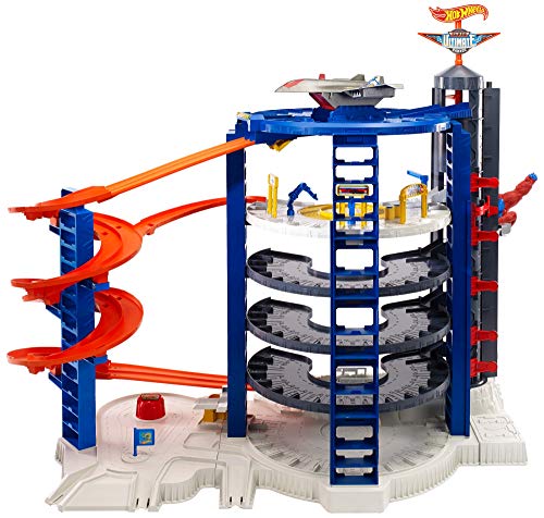Hot Wheels Toy Car Track Set & 4 1:64 Scale Cars J965